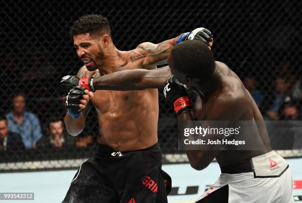 Max Griffin and Curtis Millender trade punches in their welterweight fight during the UFC 226 event inside T-Mobile Arena on July 7, 2018 in Las...