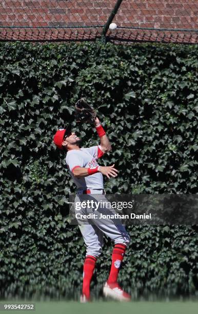 Billy Hamilton of the Cincinnati Reds makes a catch against the Chicago Cubs at Wrigley Field on July 6, 2018 in Chicago, Illinois. The Reds defeated...
