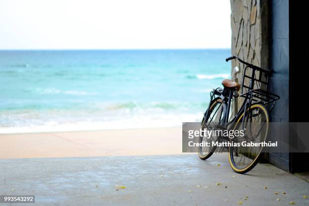 lonely bike - matthias gaberthüel stock pictures, royalty-free photos & images