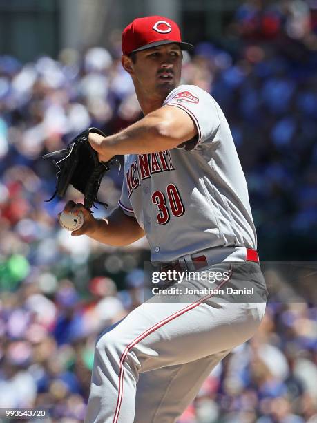 Starting pitcher Tyler Mahle of the Cincinnati Reds delivers the ball against the Chicago Cubs at Wrigley Field on July 6, 2018 in Chicago, Illinois.