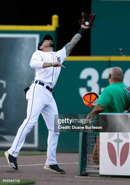 Right fielder Nicholas Castellanos of the Detroit Tigers catches a foul ball hit by Joey Gallo of the Texas Rangers during the ninth inning at...