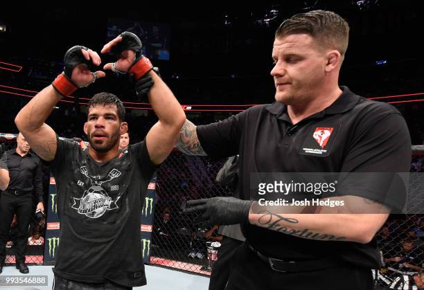 Raphael Assuncao of Brazil celebrates his victory over Rob Font in their bantamweight fight during the UFC 226 event inside T-Mobile Arena on July 7,...