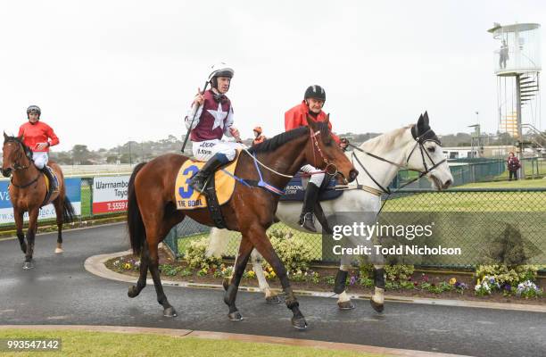 Bit of a Lad ridden by John Allen returns after the Greg Bull Painting 1JW Hurdle at Warrnambool Racecourse on July 08, 2018 in Warrnambool,...