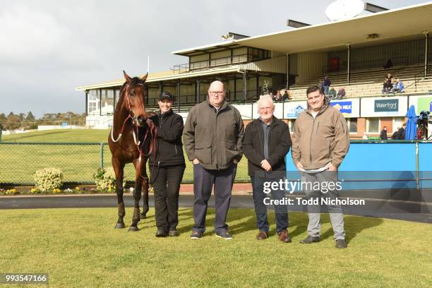 Owners of Bit of a Lad after winning the Greg Bull Painting 1JW Hurdle at Warrnambool Racecourse on July 08, 2018 in Warrnambool, Australia.