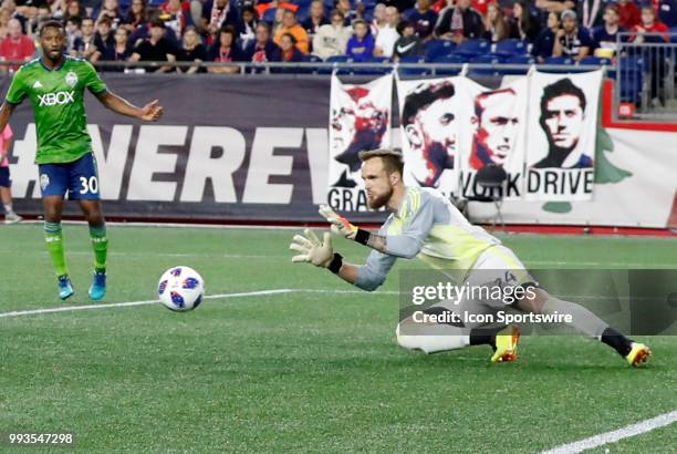 Seattle Sounders FC goalkeeper Stefan Frei makes a save during a match between the New England Revolution and Seattle Sounders FC on July 7 at...