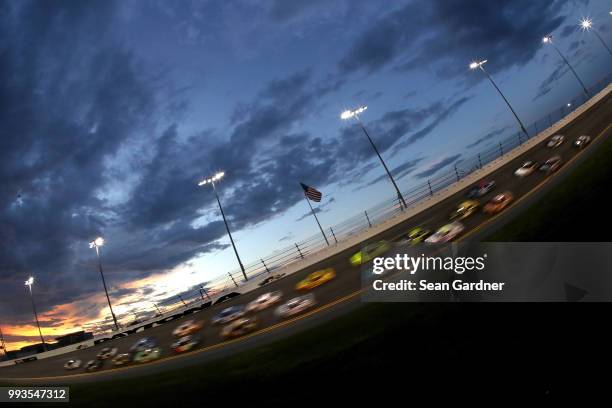 The field races during the Monster Energy NASCAR Cup Series Coke Zero Sugar 400 at Daytona International Speedway on July 7, 2018 in Daytona Beach,...
