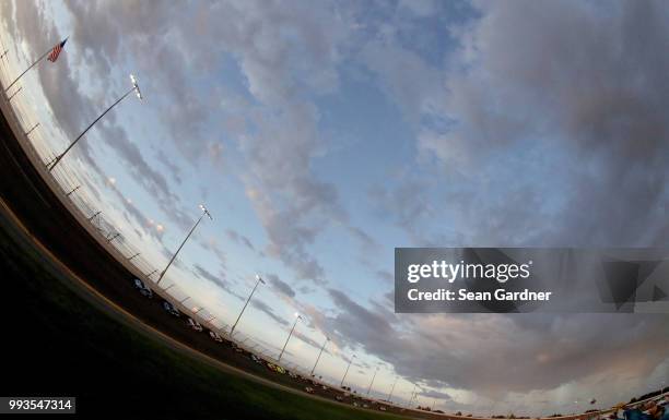 The field races during the Monster Energy NASCAR Cup Series Coke Zero Sugar 400 at Daytona International Speedway on July 7, 2018 in Daytona Beach,...