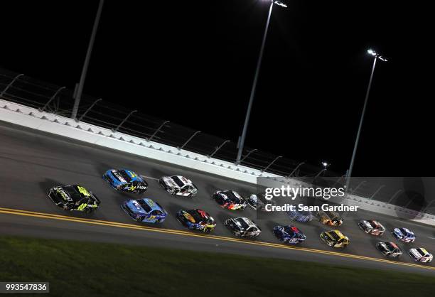 Jimmie Johnson, driver of the Lowe's for Pros Chevrolet, leads a pack of cars during the Monster Energy NASCAR Cup Series Coke Zero Sugar 400 at...