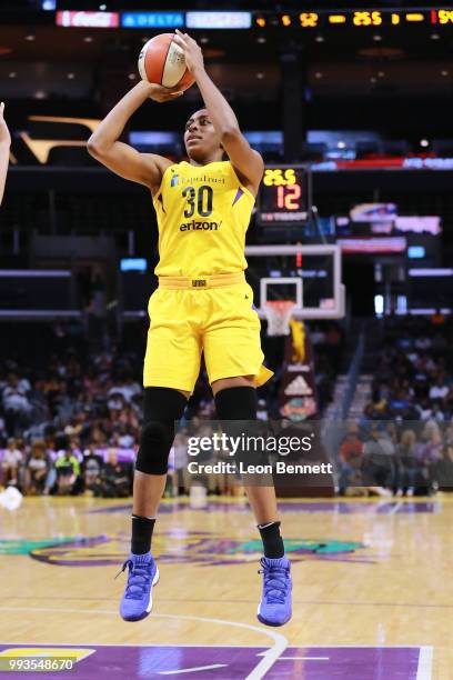 Nneka Ogwumike of the Los Angeles Sparks handles the ball against the Washington Mystics during a WNBA basketball game at Staples Center on July 7,...