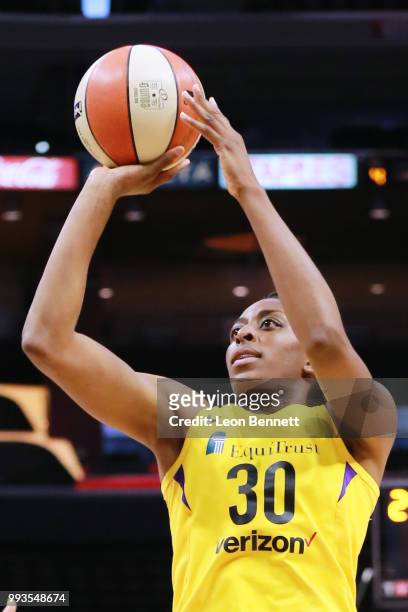 Nneka Ogwumike of the Los Angeles Sparks handles the ball against the Washington Mystics during a WNBA basketball game at Staples Center on July 7,...