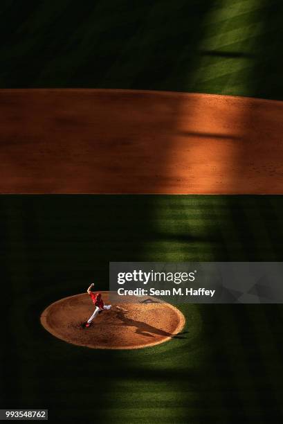 Taylor Cole of the Los Angeles Angels of Anaheim pitches during the fifth inning of a game against the Los Angeles Dodgers at Angel Stadium on July...