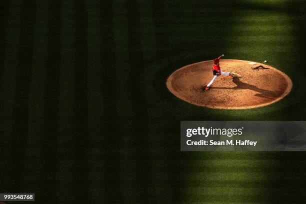 Taylor Cole of the Los Angeles Angels of Anaheim pitches during the fifth inning of a game against the Los Angeles Dodgers at Angel Stadium on July...