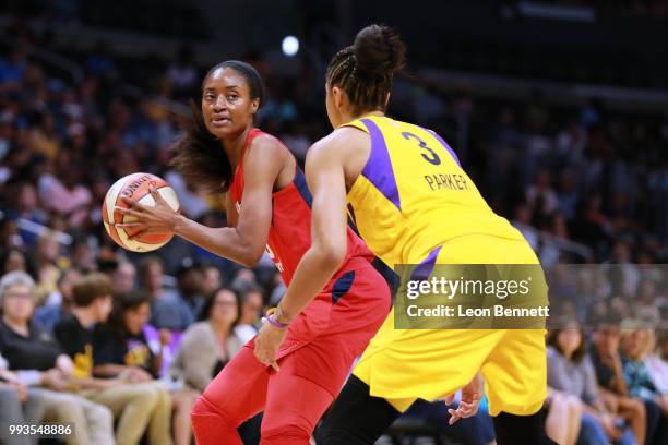 LaToya Sanders of the Washington Mystics handles the ball against Candace Parker of the Los Angeles Sparks during a WNBA basketball game at Staples...