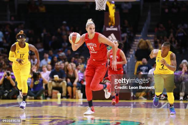 Elena Delle Donne of the Washington Mystics pushes the ball up the court against the Los Angeles Sparks during a WNBA basketball game at Staples...