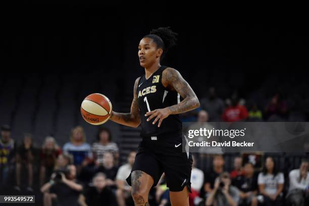 Tamera Young of the Las Vegas Aces handles the ball against the Connecticut Sun on July 7, 2018 at the Mandalay Bay Events Center in Las Vegas,...