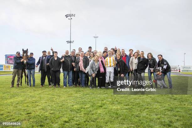 Connections pose with I Am Vinnie and Noel Callow after winning the Polytrack Maiden Plate at Racing.com Park Synthetic Racecourse on July 08, 2018...