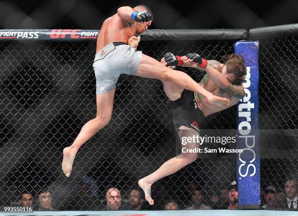 Anthony Pettis kicks Michael Chiesa during their lightweight fight at T-Mobile Arena on July 7, 2018 in Las Vegas, Nevada. Pettis won by second round...