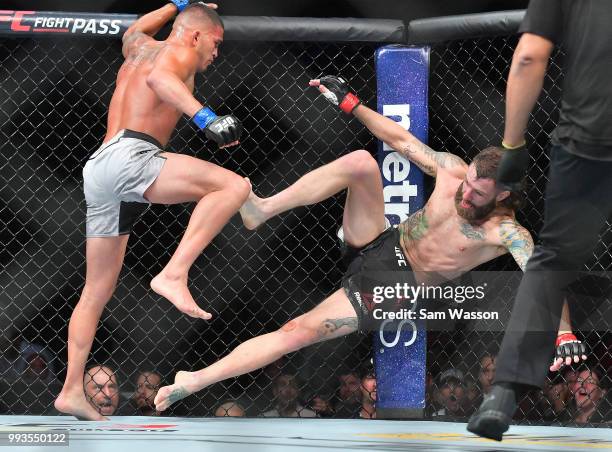 Anthony Pettis kicks Michael Chiesa during their lightweight fight at T-Mobile Arena on July 7, 2018 in Las Vegas, Nevada. Pettis won by second round...