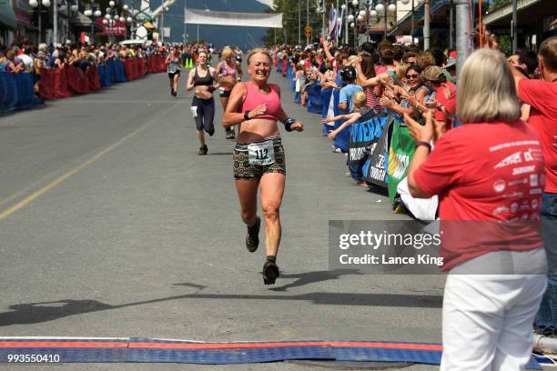 Patricia Foldager approaches the finish line during the Women's Division of the 91st Running of the Mount Marathon Race on July 4, 2018 in Seward,...