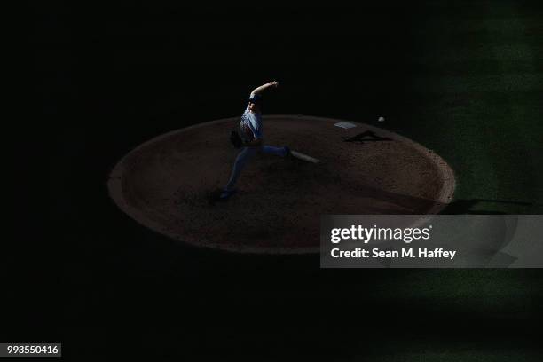 Ross Stripling of the Los Angeles Dodgers pitches during the fifth inning of a game against the Los Angeles Angels of Anaheim at Angel Stadium on...