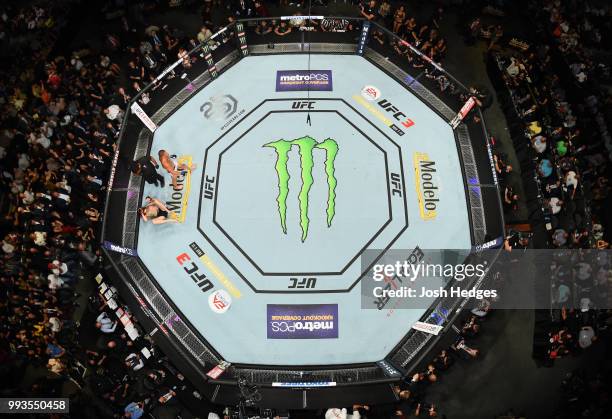 An overhead view as Anthony Pettis celebrates his victory over Michael Chiesa in their lightweight fight during the UFC 226 event inside T-Mobile...