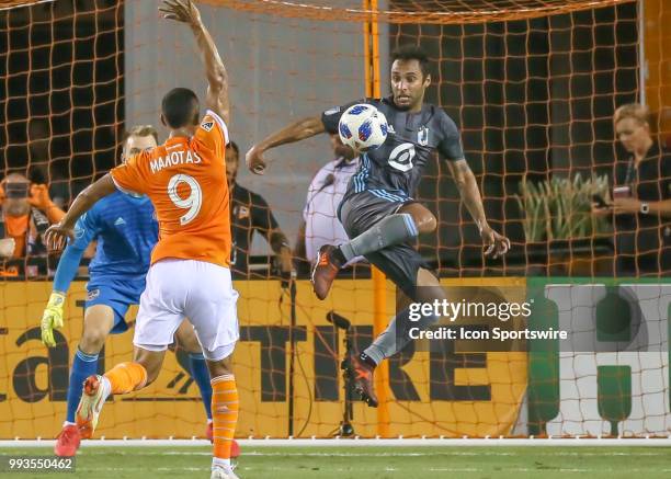 Minnesota United midfielder Ibson volleys the ball toward the goal zone during the soccer match between the Minnesota United FC and Houston Dynamo on...