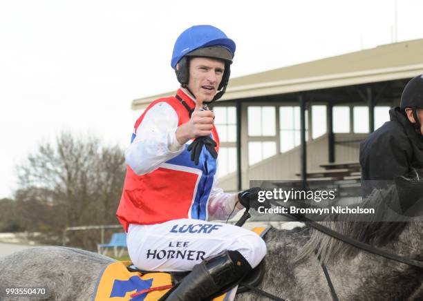 Daily Donation ridden by Lee Horner returns after the Dwyer Robinson BM58 Highweight Handicap at Warrnambool Racecourse on July 08, 2018 in...