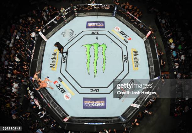 An overhead view of Michael Chiesa defending against Anthony Pettis in their lightweight fight during the UFC 226 event inside T-Mobile Arena on July...