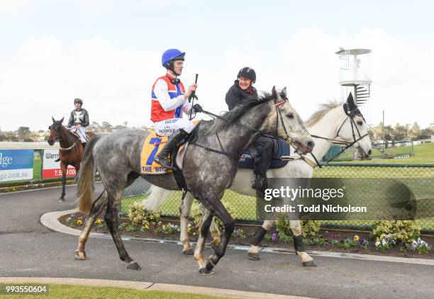 Daily Donation ridden by Lee Horner returns after the Dwyer Robinson BM58 Highweight Handicap at Warrnambool Racecourse on July 08, 2018 in...