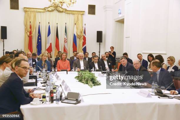 Top diplomats from Iran, Britain, China, France, Germany, Russia meet to discuss a 2015 Iranian nuclear deal in Vienna, Austria, on July 6, 2018....