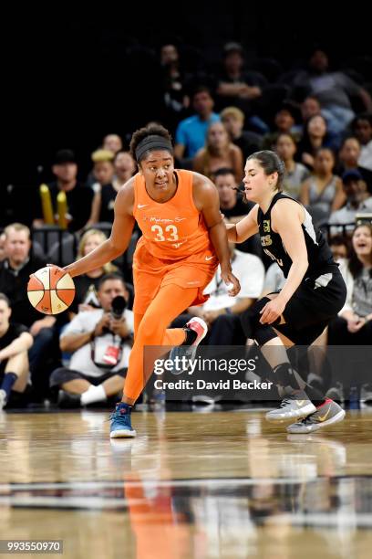 Morgan Tuck of the Connecticut Sun handles the ball against the Las Vegas Aces on July 7, 2018 at the Mandalay Bay Events Center in Las Vegas,...