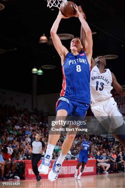 Henry Ellenson of the Detroit Pistons goes to the basket against the Memphis Grizzlies during the 2018 Las Vegas Summer League on July 7, 2018 at the...