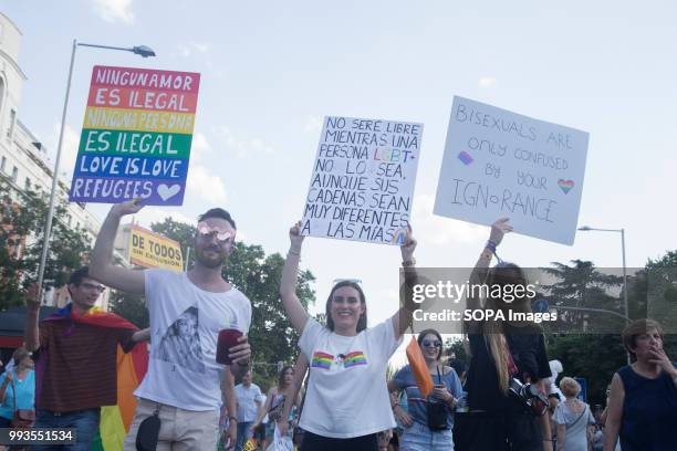 Participants show posters against LGBT Phobia during the gay parade. Thousands of people have participated the Gay Pride 2018 in Madrid to against...