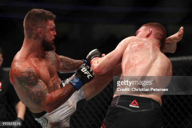 Mike Perry kicks Paul Felder in their welterweight fight during the UFC 226 event inside T-Mobile Arena on July 7, 2018 in Las Vegas, Nevada.
