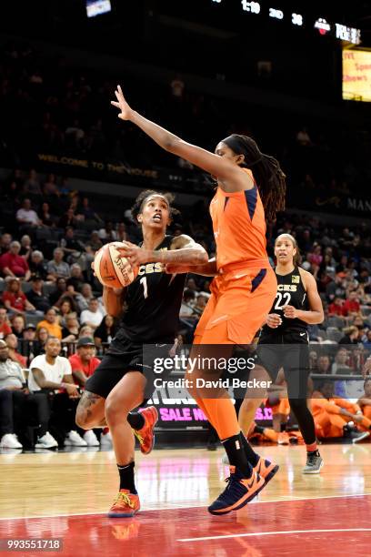 Tamera Young of the Las Vegas Aces handles the ball against the Connecticut Sun on July 7, 2018 at the Mandalay Bay Events Center in Las Vegas,...