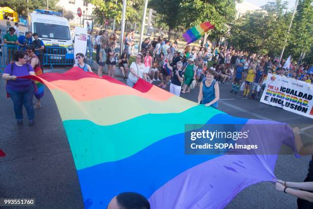 Participants seen marching with a large LGBT rainbow flag. Thousands of people have participated the Gay Pride 2018 in Madrid to against LGBT phobia.