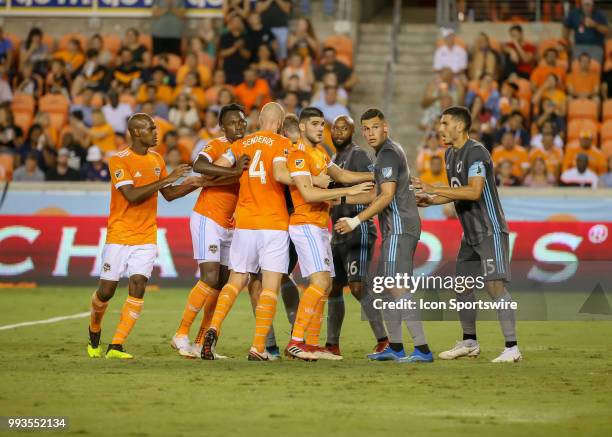 Houston Dynamo and Minnesota United players jostle for position in anticipation of a corner kick during the soccer match between the Minnesota United...