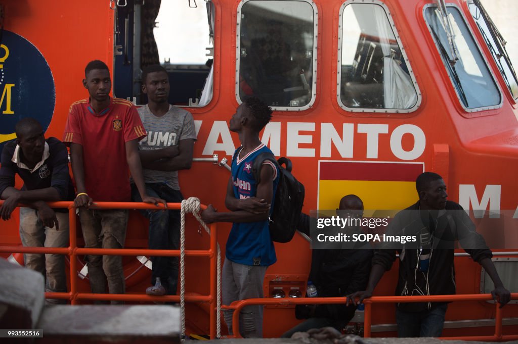 Migrants seen waiting on a rescue boat at Port of Malaga.