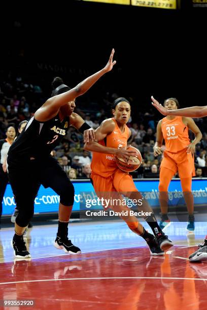 Jasmine Thomas of the Connecticut Sun handles the ball against the Las Vegas Aces on July 7, 2018 at the Mandalay Bay Events Center in Las Vegas,...