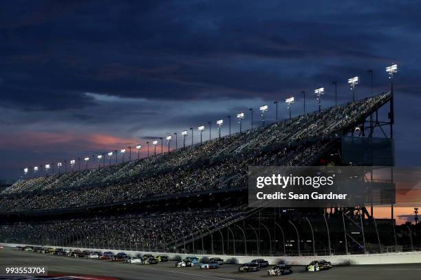 The field races down the front stretch during the Monster Energy NASCAR Cup Series Coke Zero Sugar 400 at Daytona International Speedway on July 7,...