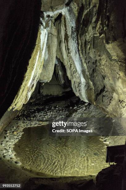 Some Water gathers in a corner inside the Cave. Ingleborough Cave is a beautiful cave close to the village of Clapham in North Yorkshire, England...