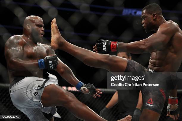 Francis Ngannou of Cameroon kicks Derrick Lewis in their heavyweight fight during the UFC 226 event inside T-Mobile Arena on July 7, 2018 in Las...