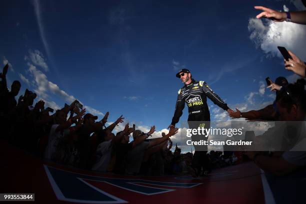 Jimmie Johnson, driver of the Lowe's for Pros Chevrolet, participates in pre race activities during the Monster Energy NASCAR Cup Series Coke Zero...