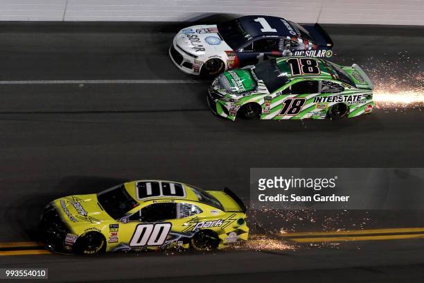 Kyle Busch, driver of the Interstate Batteries Toyota, and Joey Gase, driver of the Sparks Inc. Chevrolet, are involved in an on track incident...