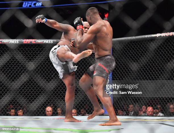 Derrick Lewis kicks Francis Ngannou during their heavyweight fight at T-Mobile Arena on July 7, 2018 in Las Vegas, Nevada. Lewis won by unanimous...