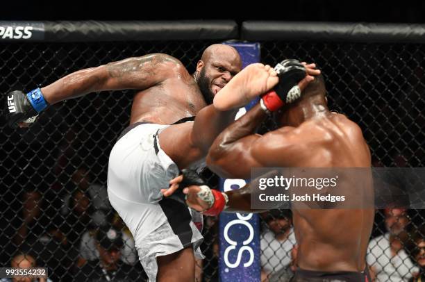 Derrick Lewis kicks Francis Ngannou of Cameroon in their heavyweight fight during the UFC 226 event inside T-Mobile Arena on July 7, 2018 in Las...