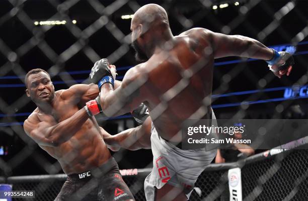 Derrick Lewis kicks Francis Ngannou during their heavyweight fight at T-Mobile Arena on July 7, 2018 in Las Vegas, Nevada. Lewis won by unanimous...