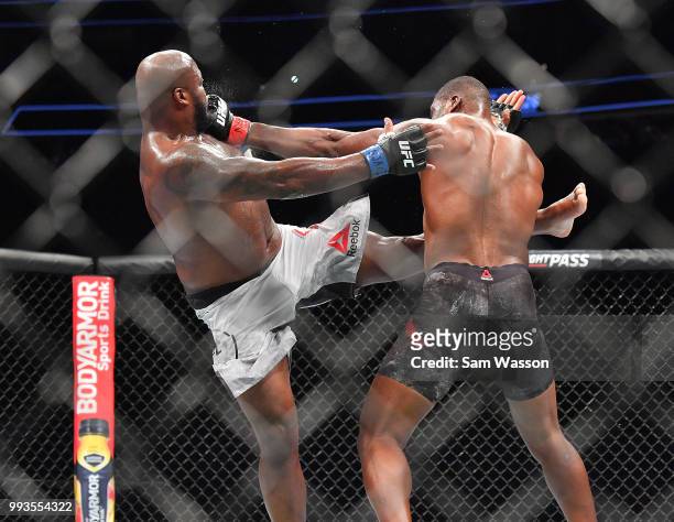 Derrick Lewis and Francis Ngannou battle during their heavyweight fight at T-Mobile Arena on July 7, 2018 in Las Vegas, Nevada. Lewis won by...