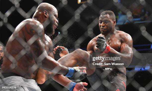 Francis Ngannou kicks Derrick Lewis during their heavyweight fight at T-Mobile Arena on July 7, 2018 in Las Vegas, Nevada. Lewis won by unanimous...