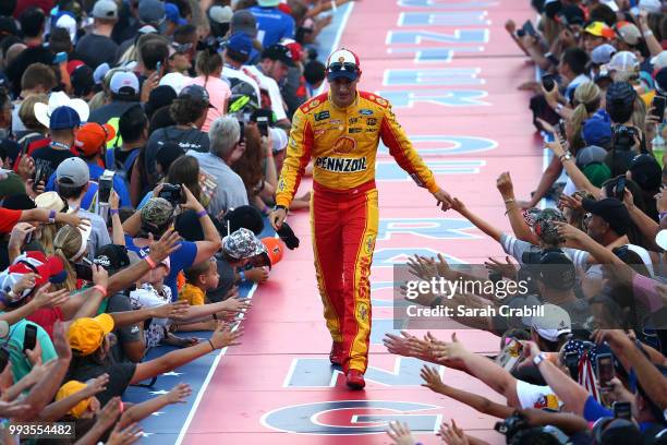 Joey Logano, driver of the Shell Pennzoil Ford, participates in pre-race activities during the Monster Energy NASCAR Cup Series Coke Zero Sugar 400...